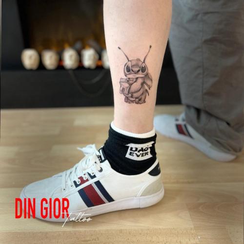 татуювання стітча і мульфільма в стилі реалізм